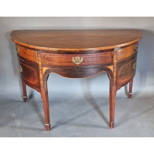 347 - A 19th Century marquetry inlaid demi-lune side table with a central drawer flanked by cupboards and ... 