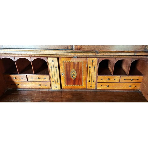 400 - A George III mahogany bureau bookcase, the moulded cornice above two astragal glazed doors enclosing... 