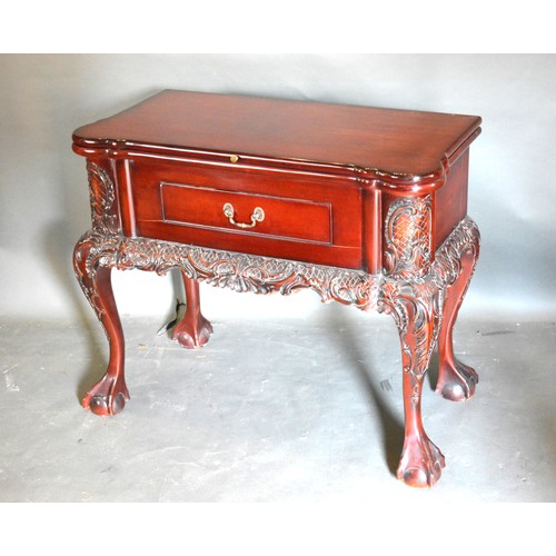 427 - A 20th Century Side Table, the hinged top above a frieze drawer raised upon carved cabriole legs wit... 