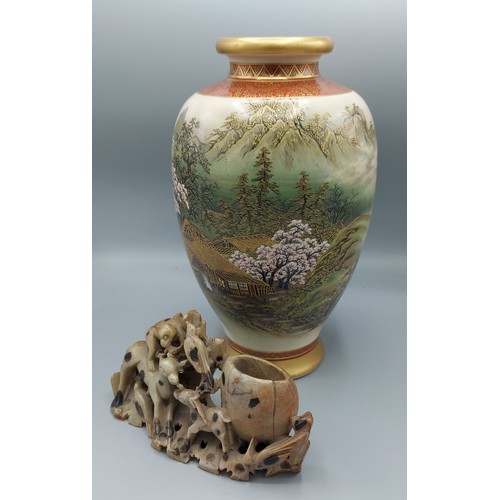 3 - A Japanese Satzuma oviform vase, 31cms tall together with a Chinese soapstone spill vase