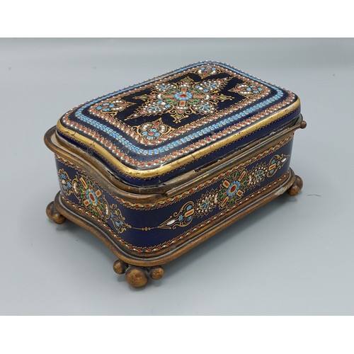 7 - A late 19th Century French porcelain and enamel casket, the hinged cover enclosing a padded interior... 