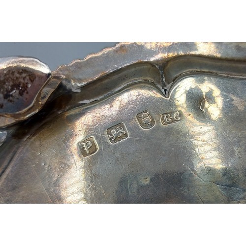 150 - A George III silver waiter of shaped outline raised upon shaped feet, London 1770, maker Ebenezer Co... 