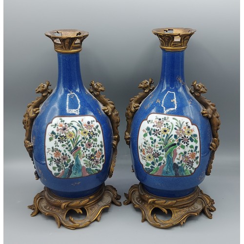 12 - A pair of 19th Century Samson Famille Verte vases with gilt bronze mounts, each decorated with a fol... 