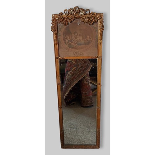 403 - A gilt framed rectangular Trumeau wall mirror with pierced carved cresting, 12cms x 38cms