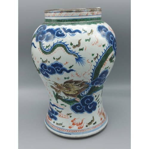 25 - A Chinese vase, decorated with serpents amongst foliage in coloured enamels, six character mark to b... 