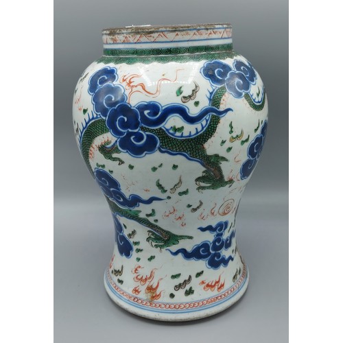 25 - A Chinese vase, decorated with serpents amongst foliage in coloured enamels, six character mark to b... 