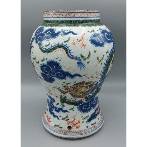 25 - A Chinese vase, decorated with serpents amongst foliage in coloured enamels, six character mark to b... 