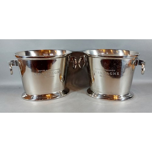 308 - A pair of large oval Champagne coolers with circular ring side handles bearing inscription, 25cms ta... 