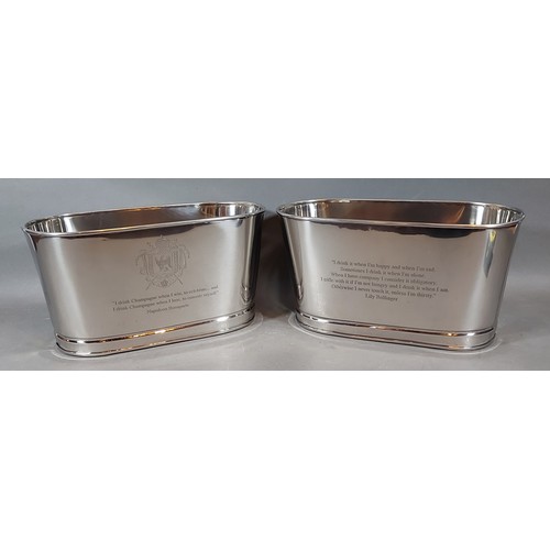 310 - A pair of Champagne coolers, each bearing Bollinger inscription, 30cms x 14cms