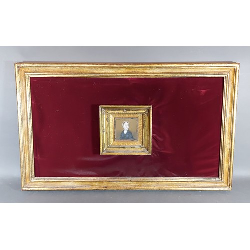 87 - A 19th Century portrait miniature of a lady in period dress, 8cms x 8cms