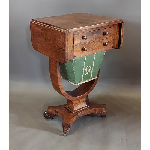 460 - A Victorian rosewood work table, the drop flap top above two frieze drawers opposed by dummy drawers... 