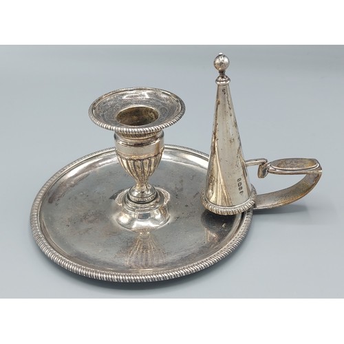 205 - A George III silver chamberstick with snuffer, London 1802 makers mark Timothy Renou, 9ozs