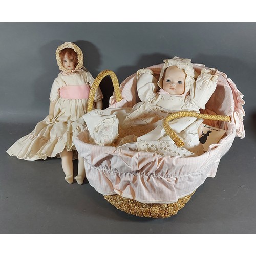 334 - An Armand Marseilles bisque headed doll together with a wax doll