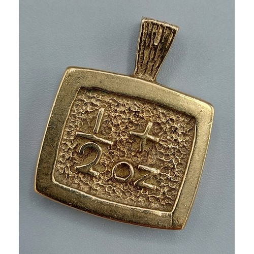 77 - A 9ct gold pendant, 17.3 grams