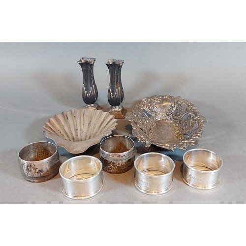 123 - A pair of Chester silver spill vases together with a London silver butter dish of scallop form, a Bi... 