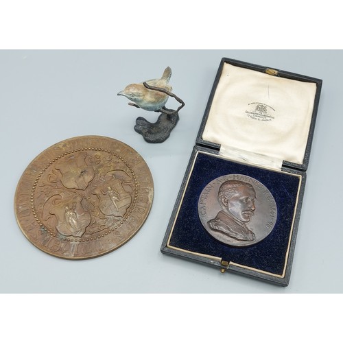 245 - A patinated bronze medallion for Captain A. E. Haynes, field fortification together with another pla... 