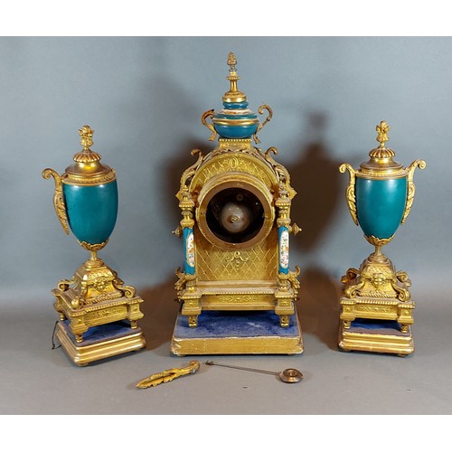 321 - A French spelter and porcelain mounted three piece clock garniture, the clock with two train movemen... 