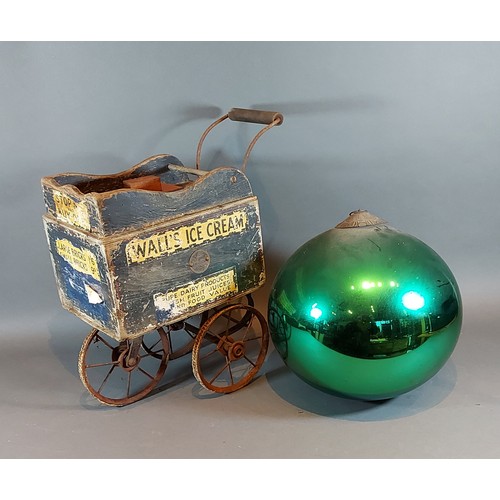 248 - A large glass witch's ball together with a Walls Ice Cream miniature cart