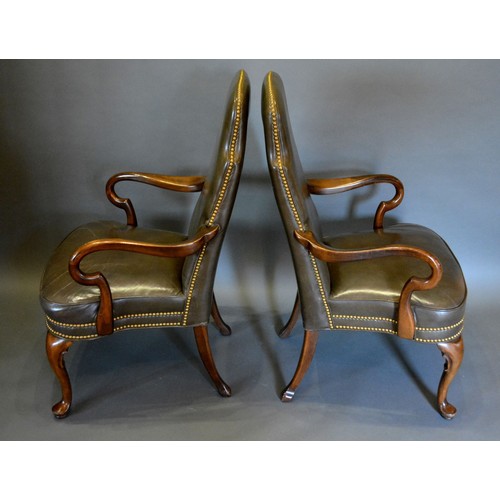 365 - A pair of Queen Anne style open armchairs, each with green leather upholstered backs and seats raise... 