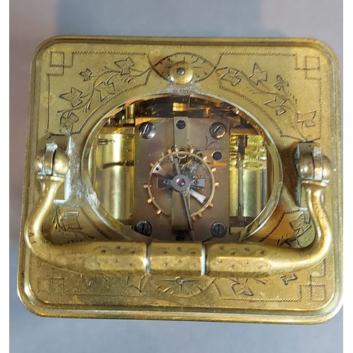 323 - A French engraved brass carriage clock, the repeater movement with lever escapement together with le... 