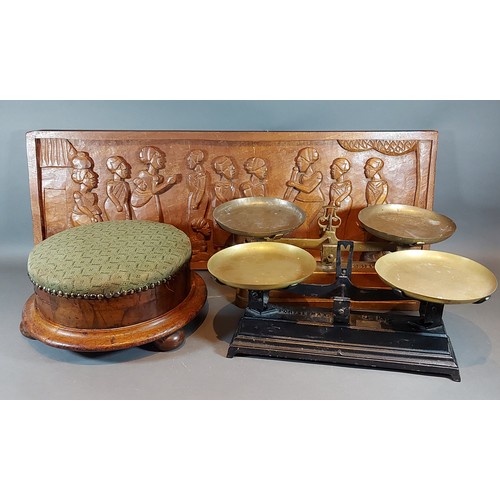 264 - A Victorian walnut and upholstered circular footstool, together with a carven wooden wall plaque and... 