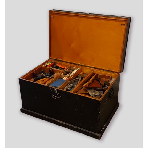 268 - A large wooden tool chest containing a collection of tools