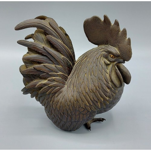 271 - A Japanese Meiji period bronze cockerel with seal mark to underside, 13cm tall