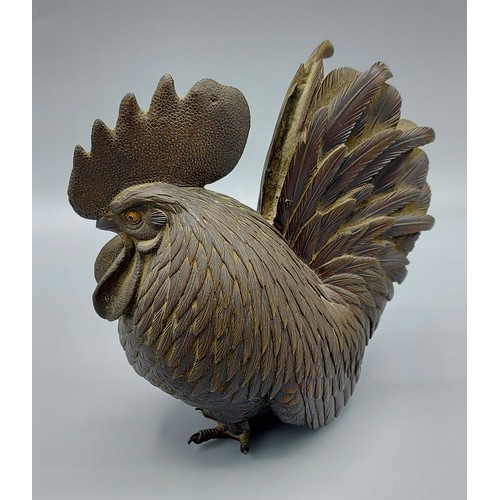 271 - A Japanese Meiji period bronze cockerel with seal mark to underside, 13cm tall