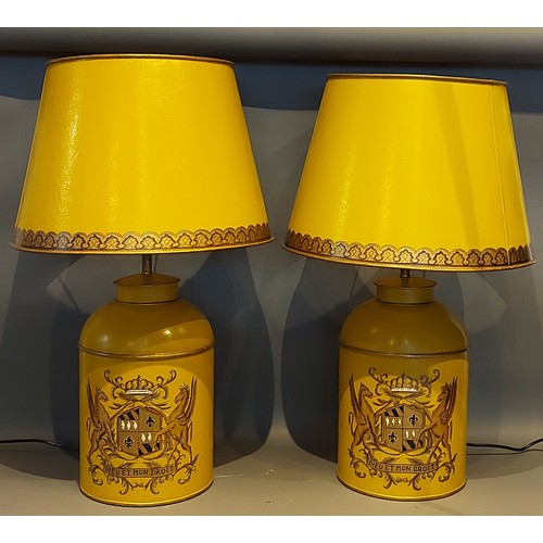 280 - A pair of Toleware table lamps, each decorated with a crest upon a mustard ground, complete with Tol... 