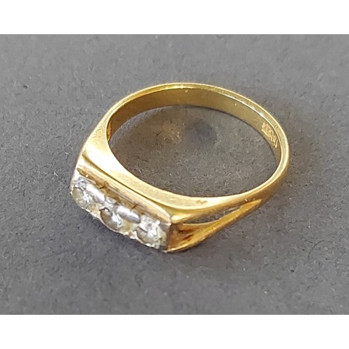 193 - An 18ct gold ring set with three diamonds, 4gms