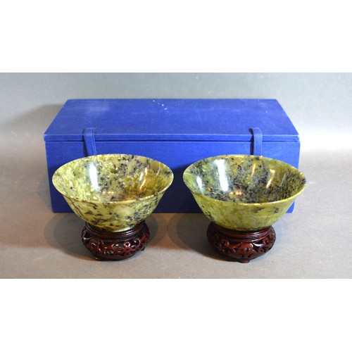 317 - A Pair Of Chinese Jade Bowls upon hardwood stands 13.5cms diameter within fitted lined box