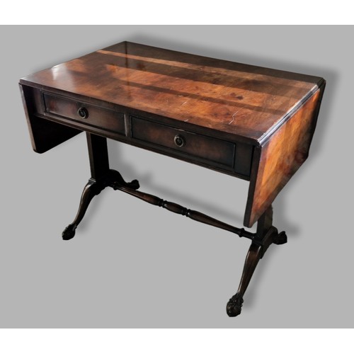 376 - A 20th Century sofa table, the drop flap top above two frieze drawers above twin end supports and ba... 