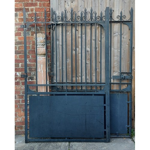 381 - A pair of large iron gates with posts, 189cms tall, both gates together 238cms wide