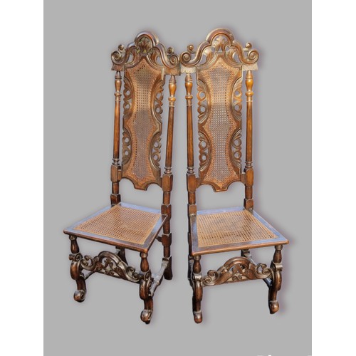 386 - A pair of 19th Century oak Charles II style side chairs, each with a pierced carved and partly caned... 