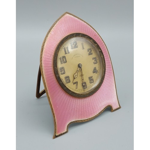 106 - A Birmingham silver and pink enamel decorated table clock the dial inscribed Sir John Bennett Ltd Lo... 