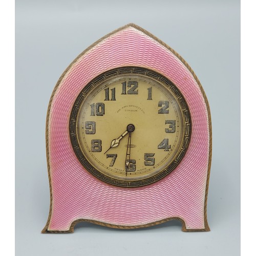 106 - A Birmingham silver and pink enamel decorated table clock the dial inscribed Sir John Bennett Ltd Lo... 