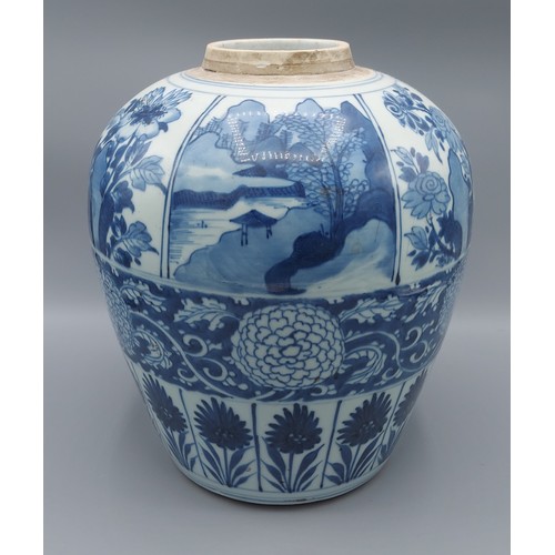 13 - A Chinese blue and white jar of tapering form decorated with   landscapes amongst foliage, 27cm tall