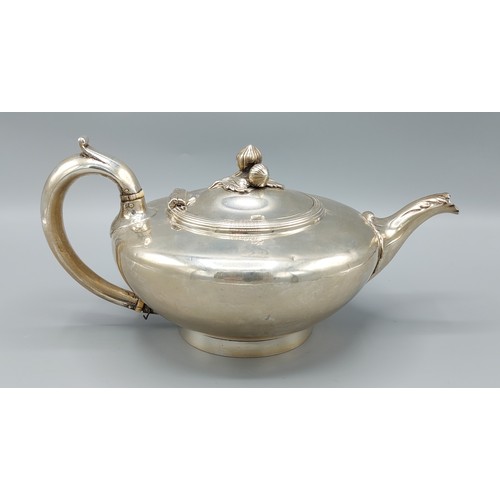 109 - A Victorian silver teapot of circular form, London 1840, marker mark W.M, 26ozs, 13cms tall