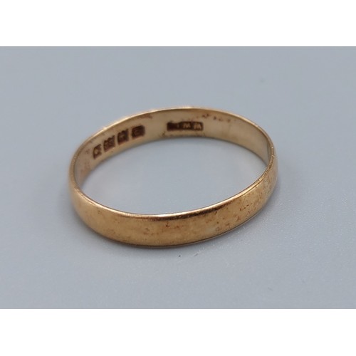 130 - A 22ct gold wedding band, ring size U, 3.2gms