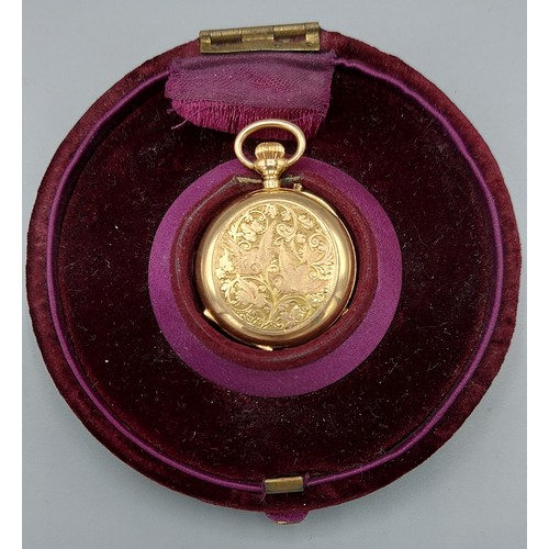 146 - A French gold fob watch, the enamel dial with Roman Numerals and with engraved case and within a lin... 