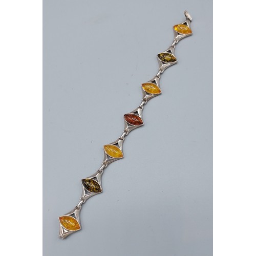 153 - A silver and Amber set bracelet