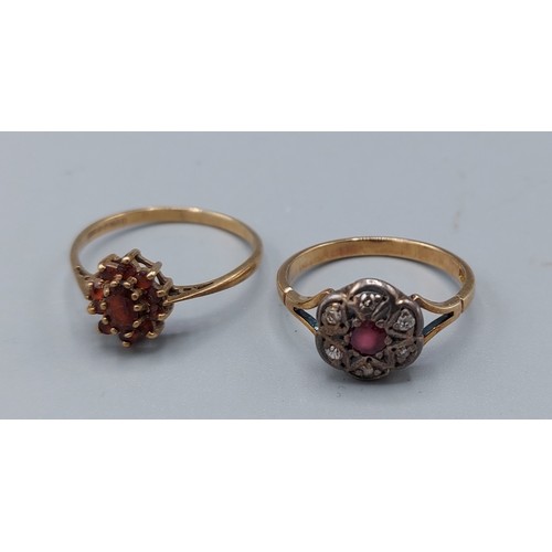 183 - An 18ct gold diamond and ruby cluster ring, 2.6gms, ring size N together with a 9ct gold garnet set ... 