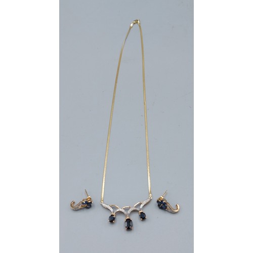 192 - A 9ct gold necklace set with diamonds and sapphires with flat link chain together with a pair of mat... 