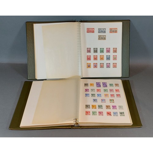 307 - Two stamp albums containing Malaya stamps and others countries, mint and used,