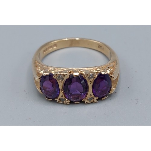 206 - A 9ct gold amethyst and diamond set ring, 5gms, ring size N