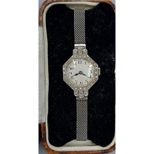 221 - An 18ct white gold and platinum ladies wristwatch