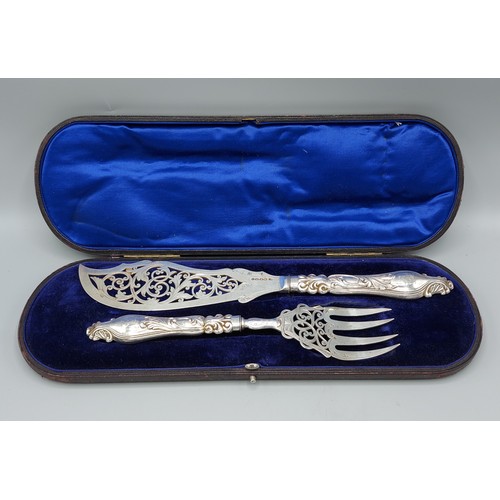 236 - A pair of Victorian silver fish servers, Birmingham 1869 within fitted case