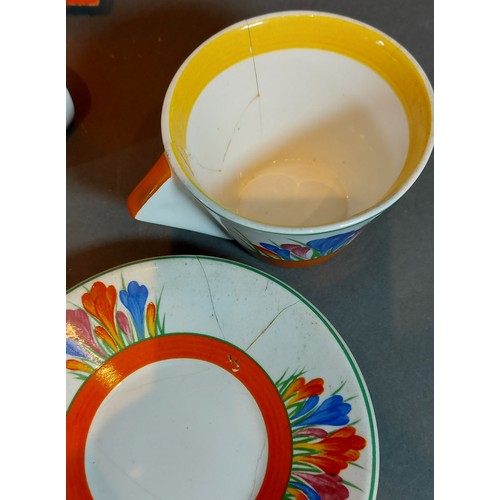 44 - A limited edition Clarice Cliff style tea for two service with crocus pattern decoration