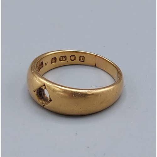 241 - An 18ct gold Gypsy ring, (stone missing), 7.5 grams