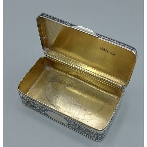 A Russian silver Niello snuff box, the inged cover decorated with a ...